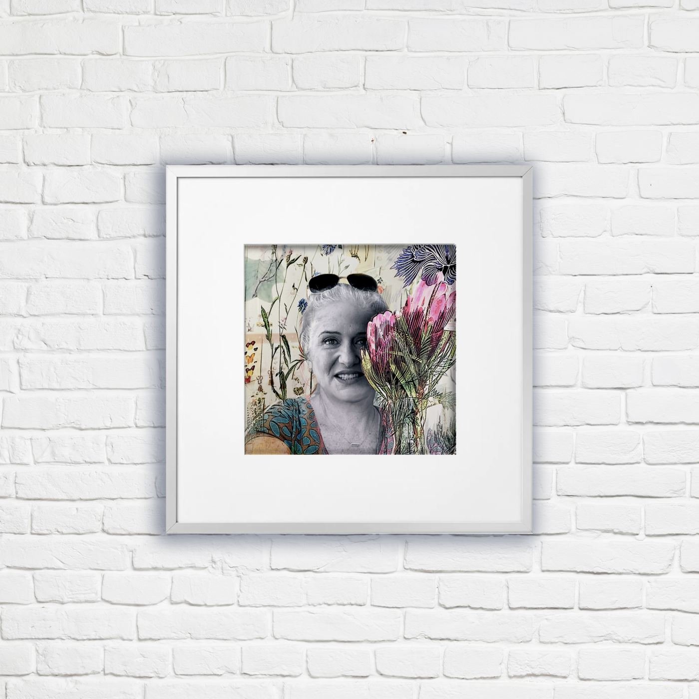 Framed digital portrait fine art on a white brick wall
